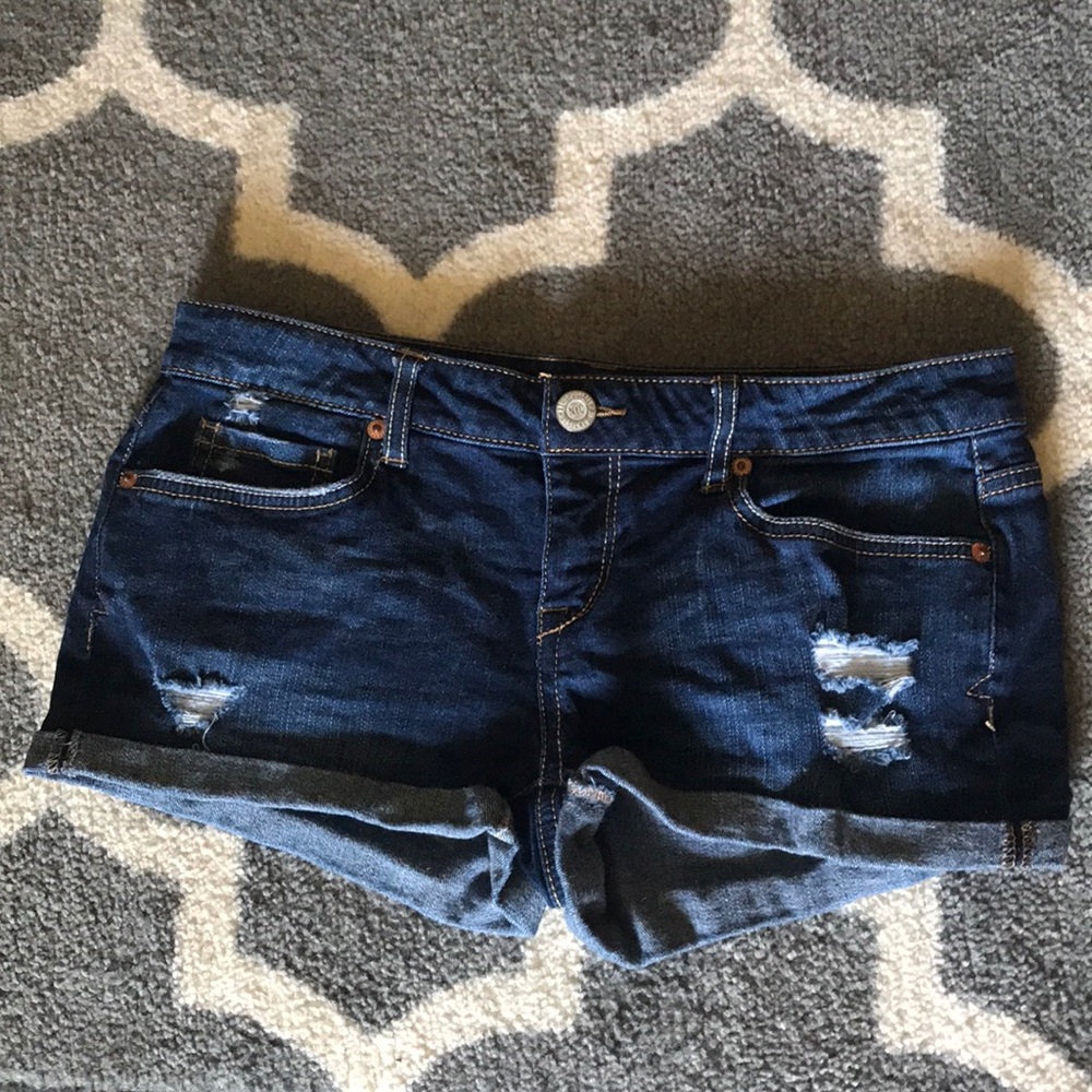 Dark wash distressed jean shorts